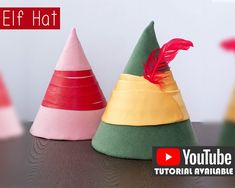 three different colored cones with a red feather on top and the words youtube written below