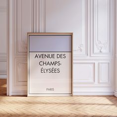 an empty frame in front of a wall with the words avenue des champs - elysees on it