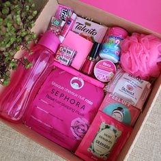 a pink box filled with personal care items