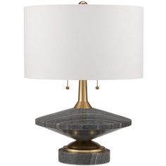 a table lamp with a marble base and white lampshade on the top one