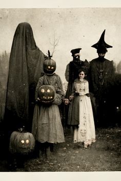 three people dressed up as witches with pumpkins in front of an old - fashioned photo