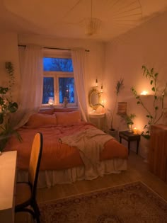 a bed room with a neatly made bed next to a window