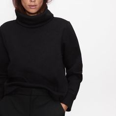 You Cannot Go Wrong With A Black Outfit... Top So Cozy And Warm! Love Loose High Neckline Oversized Cozy Workwear Tops, Casual Black Funnel Neck Top, Casual Black Turtleneck Sweatshirt, Oversized Black Funnel Neck Tops, Oversized Black Tops With Funnel Neck, Chic Black Tops With Ribbed Cuffs, Black Funnel Neck Sweatshirt With Relaxed Fit, Black Sweatshirt With Funnel Neck In Relaxed Fit, Black Sweatshirt With Relaxed Fit And Funnel Neck