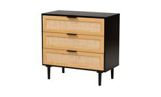 a wooden dresser with two drawers and black top, against a white background the drawer has wicker baskets on it