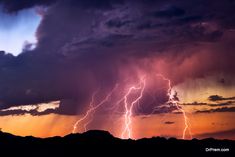 a large cloud filled with lots of lightning