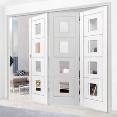 an open white door leading to a living room