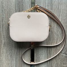 Beautiful Mini Tory Burch Emerson Crossbody In Blush Color. Only Used A Few Times In Excellent Condition. Tory Burch Logo On Front. Side Pocket In Interior. Comment For More Pics! Dust Bag Included Size: 5” Tall 6.75” Long 2.25” Wide Tory Burch Belt Bag, Tory Burch Emerson, Foldover Crossbody Bag, Tory Burch Crossbody Bag, Tory Burch Crossbody, Tory Burch Robinson, Shearling Boots, Tory Burch Miller, Tory Burch Bags