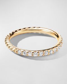 a gold ring with diamonds on it