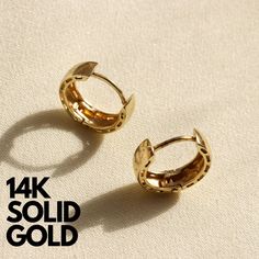 14K Gold Bold Huggie Hoop Earrings FEATURES: -Gold KT: 14K Solid Gold -Gold Color: Yellow Gold, White Gold -Closure: Hinged Snap Back -Diameter: 11.5 mm -Thickness: 3mm -Sold as a pair SHIPPING: -Ready to Ship in 1-2 Business Days -FREE shipping on all U.S. orders  -Packed in a labeled gift box -The perfect birthday or holiday (Christmas, Hanukah, valentines day...etc.) gift!  -We ship globally RETURNS: -Easy 30 Day Return Policy CONTACT US: -Contact us with any inquiries by Etsy convo :   MY SH Cheap Metal Huggie Earrings For Gift, Luxury Brass Huggie Earrings As Gift, Affordable Adjustable Modern Huggie Earrings, 14k Gold Huggie Earrings With Lever Back, Yellow Gold 14k Huggie Hoop Earrings, 14k Yellow Gold Huggie Hoop Earrings, Gold 14k Stamped Small Hoop Huggie Earrings, Gold Small Hoop Huggie Earrings Stamped 14k, 14k Gold Hoop Earrings With Lever Back