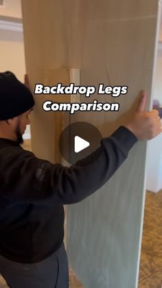 a man holding up a board with the words back drop legs comparison