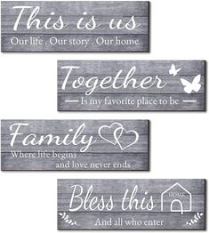 three wooden signs with the words, family and love in white ink on wood planks