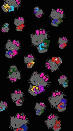 a bunch of hello kitty stickers on a black background with different colors and sizes