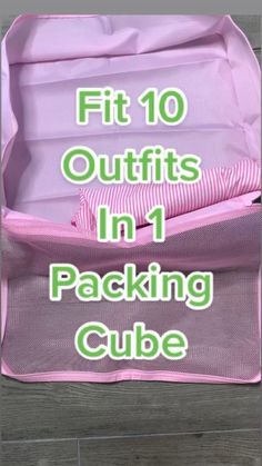 a pink suitcase with the words fit 10 outfits in 1 packing cube