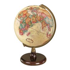 an old world globe on a wooden stand with a white back ground and brown base