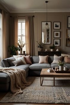 a living room filled with furniture and lots of windows