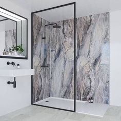 a bathroom with marbled walls and flooring is shown in this image, there are two sinks on either side of the shower