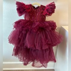 Worn Only Once For A Photo Shoot. Paid Originally Over $220. Burgundy Color, About Size 2t (Estimating Since It Was Made To Order) My Daughter Was 28 Lbs And 2’9 Feet Tall And Fit Perfectly. Asking For $145 - Discounted Shipping! . *Last Picture Is From The Store On Etsy* Boutique Dress, Burgundy Color, Kids' Dresses, My Daughter, Kids Dress, Photo Shoot, A Photo, Lily, Formal Dresses