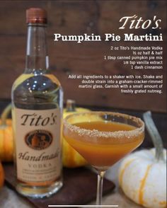 a pumpkin pie martini with an orange garnish in the glass next to it