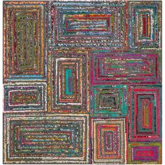 an abstract rug with many different colored squares