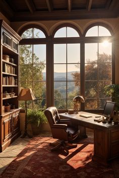 the sun shines through large windows into a room with a desk and bookcase