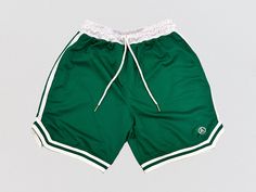 All New Boston Green Mesh Basketball Shorts Perfect for all hoopers Men and Women  Lightweight, breathable polyester material perfect for running and hooping Look great on and off the court with our Mesh Basketball shorts with ribbed lining and 5 inch inseam  *ALL ORDERS SHIP WITHIN 1 BUSINESS DAY! * Fitness Shorts, Clothing Pieces, Mesh Shorts, Basketball Shorts, The Court, Shorts With Pockets, Workout Shorts, Polyester Material, Short Outfits