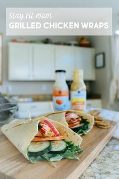 two wraps are sitting on a cutting board