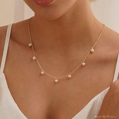 Dangle Fresh water Pearl Necklace, Minimalist Multiple Pearls Necklace, Gold Pearl Necklace, Bridal Necklace, Bridesmaid Gift, Christmas Gift This elegant pearl necklace is favoured by bridal teams and can easily be worn by the bride, bridesmaids or mother of the bride for a stylish and elegant look. A sophisticated choice of wedding accessories, they exude timeless glamour and add an extra touch of glamour to the special day. --------------------------------------------------- Overall length  40cm plus 5cm extension chain FEATURES Crafted with 100% Natural Freshwater Pearls Material: Brass Nickel free Available Colors: Gold -------------------------------------------------- ♡ ATTENTION Kindly be informed that our pearl earrings feature natural pearls. Although I strive to pair them as clo Pearl Necklace Bridal, Fresh Water Pearl Necklace, Water Pearl Necklace, Timeless Glamour, Necklace Bridal, Pearls Necklace, Gold Pearl Necklace, Necklace Minimalist, Fresh Water Pearl