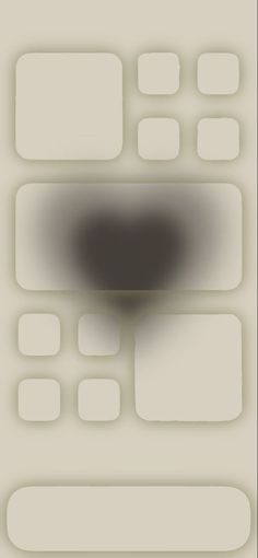 a blurry image of squares and rectangles in white, gray and black