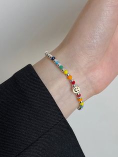 🌈 Add a touch of sweetness to your look with this charming accessory! 🍬💫 Whether it's a casual day out or a special occasion, this bracelet will be the perfect complement to your style. 😍 #FashionStatement #CharmBracelet #SmileWithStyle #AccessorizeBeautifully #bracelet #jewelry #handmade #necklace #fashion #bracelets #accessories #earrings #jewellery #ring #silver #gold #handmadejewelry #bijoux #jewels #gelang #jewelrydesigner Smiley Bracelet, Bungee Cord, Silver Colour, Hand Jewelry, Crystal Bracelet, Bracelet Stack, Smiley Face, Crystal Bracelets