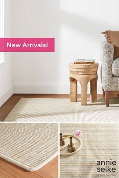 a living room with white walls and wood flooring, including a beige rug on the floor