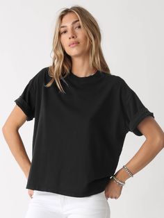 Your search for the perfect classic tee is over with the Monica tee. Made of ultra-soft cotton, with a relaxed fit and crew neck, you’ll want to live in this tee and own it in every color. Fabric: 100% Cotton. Color-way: Onyx. Models are 5'9" and wearing size small. Machine Wash. Tumble dry low. Made in the USA. Everyday Crew Neck T-shirt With Rolled Sleeves, Sporty T-shirt With Relaxed Fit And Shirttail Hem, Trendy Relaxed Fit T-shirt For Layering, Casual Relaxed Fit Muscle Tee, Relaxed Black Top For Everyday, Relaxed Black Tops For Everyday, Basic T-shirt With Shirttail Hem For Layering, Basic Soft-washed T-shirt For Layering, Black Relaxed Fit Muscle Tee For Everyday