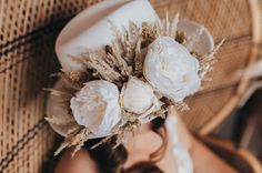 We love all our boho brides out there, but this boho hat style give off that golden, Autumn feel! This hat shows off all the golden hues of fall we all love so much! It is made with neutral tones to match any boho wedding colors. It is made with a felt, white, wide brim hat with a light brown belt attached. The flowers are all added by hand! We hope you enjoy this gorgeous hat as much as we do. Boho Bridesmaid Hats, Bohemian Wide Brim Wedding Hat, Bohemian Beige Hats For Western-themed Events, Bohemian Felt Hat For Western-themed Fall Events, Hats Boho Bridal, White Wide Brim Hat, Boho Wedding Colors, Golden Autumn, Silk Florals