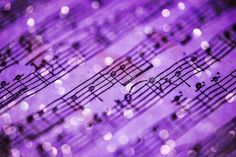 purple music notes with blurry lights in the background stock images and clippings