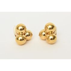 This is part of Chairish’s Costume Jewelry assortment.  These ultra fabulous, unusual and sculptural signed period vintage Chanel gold plated 3 cluster ball or sphere clip on earrings are so chic. They are geometric and have the signature interlocking CC's on each ball. From the 90's. They are signed Chanel 27 Made In France. 27 refers to the season. In very great vintage condition. They are very wonderful on and make a chic and bold statement. For day or evening wear and all seasons. They have Chanel Sign, 3 Logo, Vintage Chanel, Gold Plated Earrings, Evening Wear, Costume Jewelry, Clip On Earrings, Gold Plate, Chanel