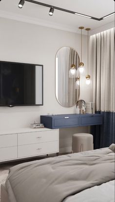 a bedroom with a large flat screen tv mounted to the wall