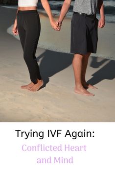 two people holding hands on the beach with text saying trying ivf again conflicted heart and mind