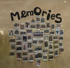 a bunch of pictures are hanging on the wall with words and photos attached to it