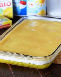 an uncooked casserole sitting on top of a wooden table