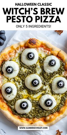 a pizza with googly eyes on it and the words witch's brew pesto pizza