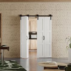 a living room filled with furniture and white doors