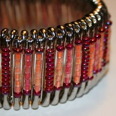 a close up of a bracelet with beads on it