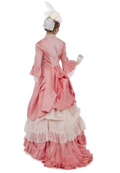 You will adore wearing this fabulous 3-piece dress! You choose the dupioni color for the polonaise jacket and underskirt, as well as the lace and taffeta color for the overskirt and trim on the jacket. This set consists of three pieces: a Polonaise, taffeta overskirt and dupioni underskirt. The polonaise bodice has a square neckline in front accented with lace, and framed by a lace-overlay in center front and back. Elbow length sleeves have a dupioni ruffle and lace flounces. The underskirt is m Satin Victorian Dress With Ruffles In Ball Gown Shape, Satin Victorian Ball Gown With Ruffles, Pink Fitted Costume Gown, Pink Taffeta Dress With Ruffles, Fitted Taffeta Dress With Ruffles, Pink Elegant Gown For Costume Party, Elegant Pink Gown For Costume Party, Marie Antoinette Gown For Costume Party, Marie Antoinette Style Costume Dress With Ruffles