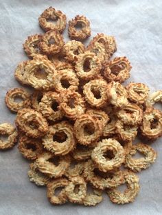 a pile of oatmeal rings sitting on top of a piece of paper