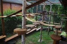 an outdoor area with wooden benches and trees