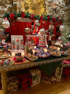 a table filled with lots of food and decorations