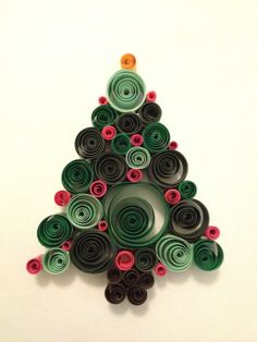 a christmas tree made out of rolled up paper