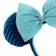 Like Minnie Mouse, you'll be a sparkling, timeless classic in this azul ears headband with signature glittery bow! * Soft foam mouse ears * Soft-feel finish and embroidered zig-zag on ears and headband * Contrasting oversize bow with glitter finish * One size * Created for Disney Parks * Made from polyester, excluding trims * Wipe clean ** Authentic Disney Parks merchandise. ** Magic Bands, Disney Home, Disney Star Wars, Disney Merchandise, Ear Headbands, Mouse Ears, Baby Disney, Pandora Jewelry, Shop Mens Clothing