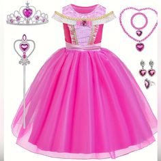 a pink princess dress with tiara and necklaces