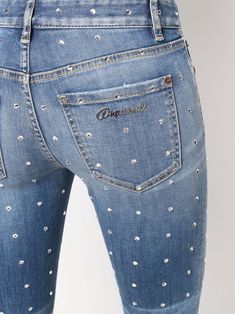 Blue cotton-blend crystal-embellished cropped jeans from DSQUARED2 featuring crystal embellishment, cropped, skinny cut, front button and zip fastening, low-rise, belt loops and classic five pockets. | DSQUARED2 Crystal-Embellished Cropped Jeans Crystal Jeans, Fitted Denim Jeans With Rhinestones, Blue High Waist Rhinestone Jeans, Crystal Embellished Denim Jeans, Casual Jeans Outfit Summer, Jean Top Outfits, Denim Rhinestone-embellished Short Bottoms, Rhinestone Jeans, Bling Jeans