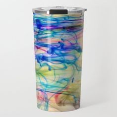 an abstract painting on the side of a stainless steel travel mug